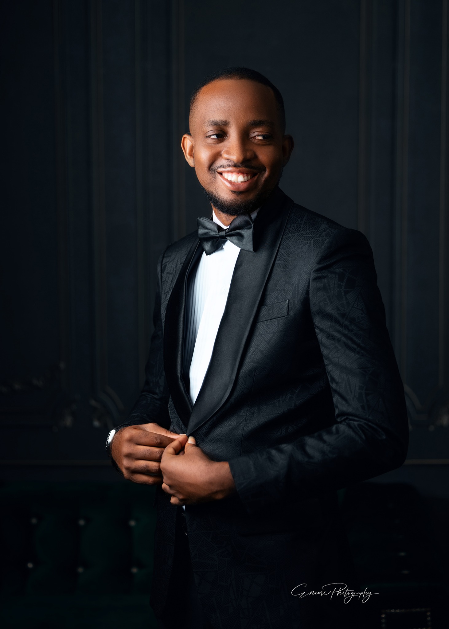 Azasoo Andrew smiling in a tuxedo