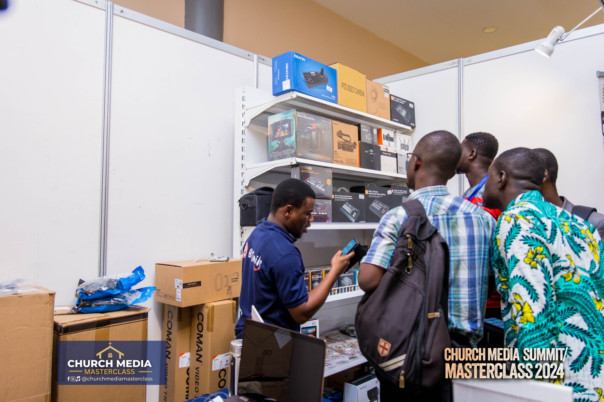 Participants exploring church production equipment