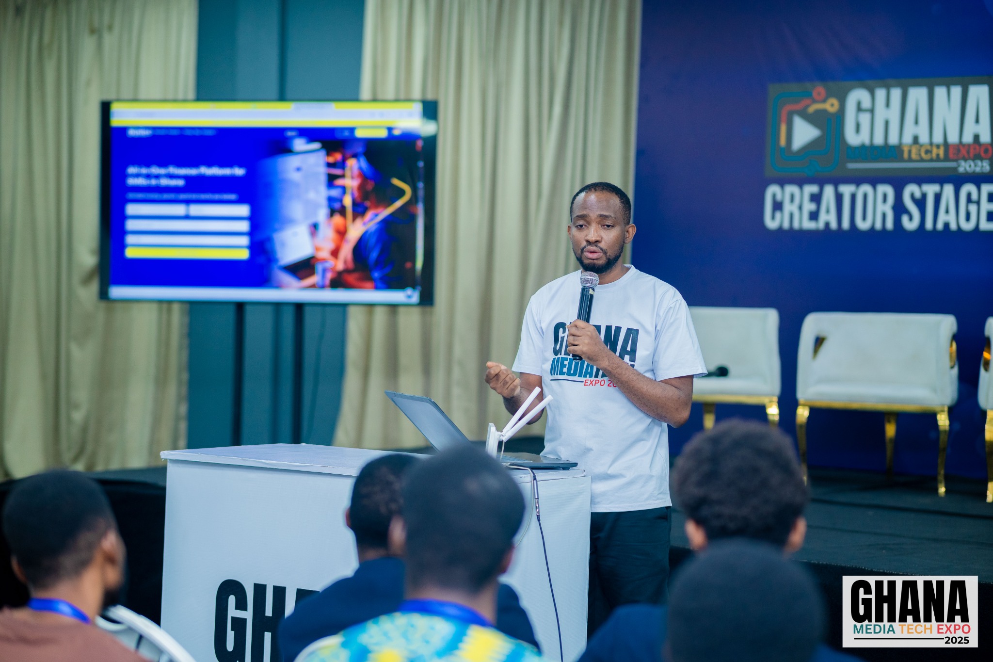 Azasoo Andrew speaking on the Creator Stage at Ghana Media Tech Expo 2025